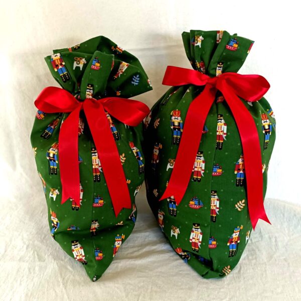 Nutcracker reusable fabric gift bag. The Party Godmother Christmas party supplies.