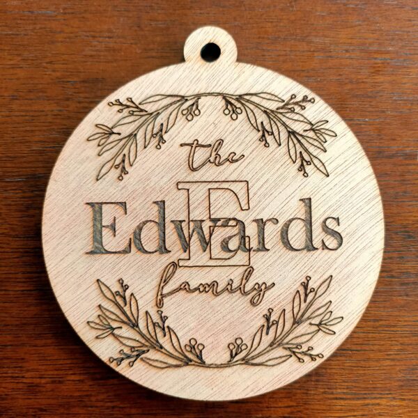 Wooden family bauble keepsake. The Party Godmother Christmas gift supplies.