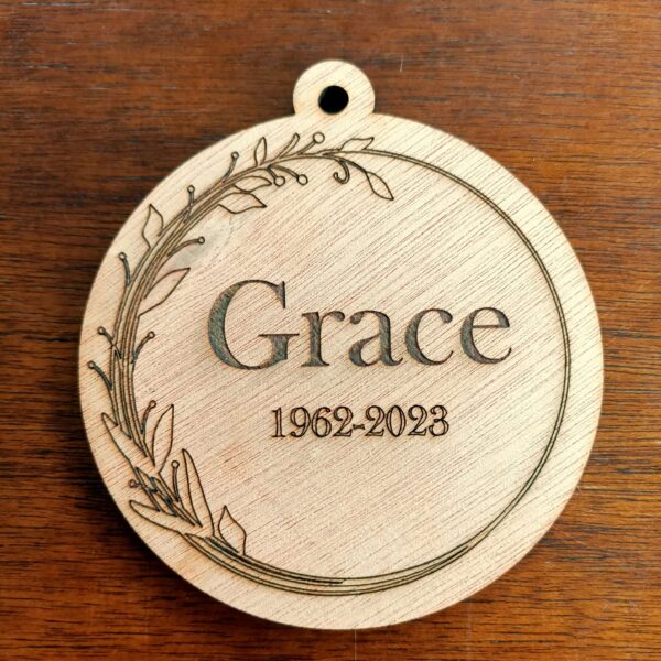 Wooden memory bauble keepsake. The Party Godmother Christmas gift supplies.