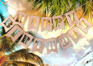 A wooden happy birthday sign