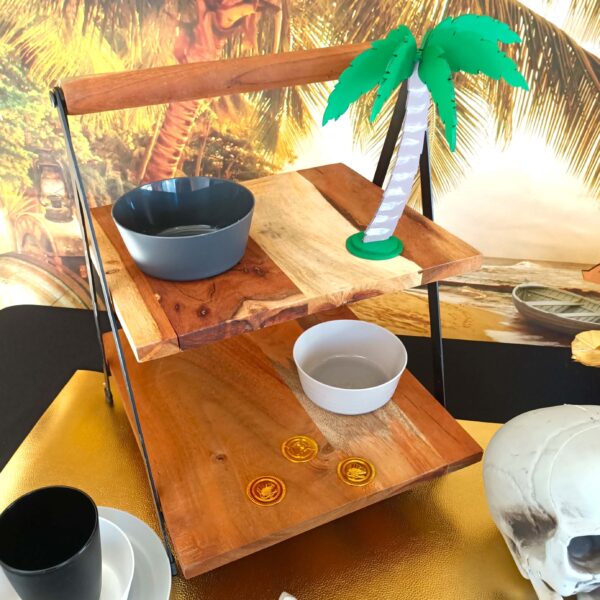 A wooden tiered food stand